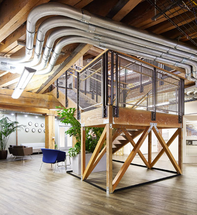 custom staircase construction in tech office | Rossi Builders Photos