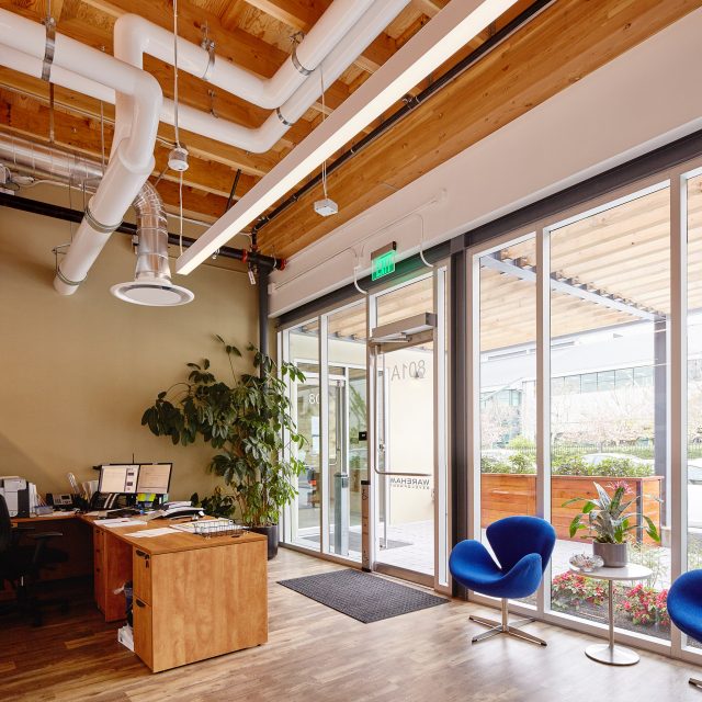 reception room office construction with high ceilings | Rossi Builders Photos